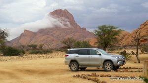 Toyota Fortuner by a mountain in Namibia | Photo Credits - Sara Essop
